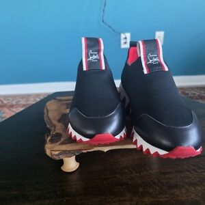 Christian Louboutin Black Sneakers with Red Accents